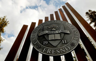 Monument sign with seal of California State University, Fresno