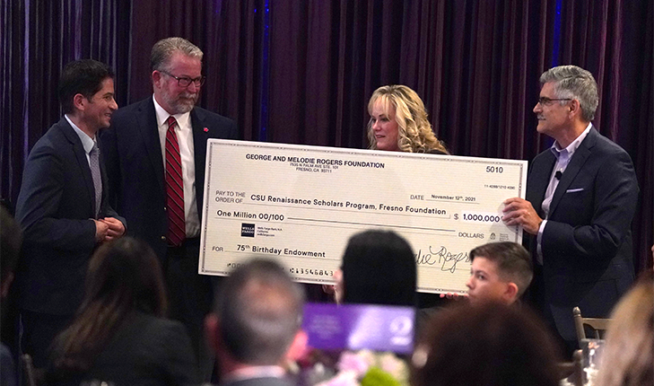 Melodie Rogers presents a check for $1 million to Fresno State for the George and Melodie Rogers Foundation Renaissance Scholars Summer Internship Program Endowment