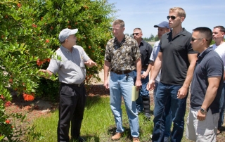 Marines learning about agriculture