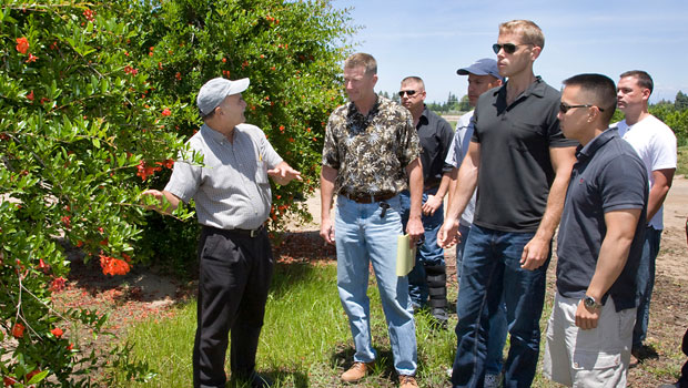 Marines learning about agriculture