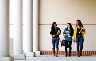 Students walking by the music building