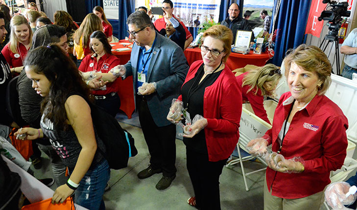 Dr. Castro, Mary Castro and Dean Witte at the World Ag Expo