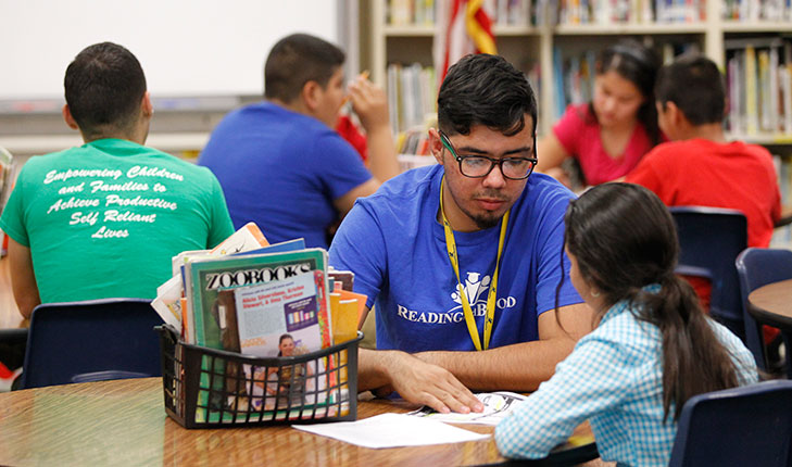 Students helping kids