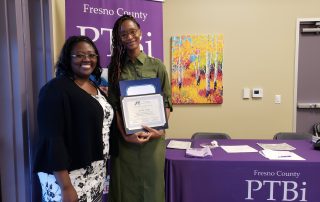 From left, Kristin Carraway and Jessica Smith at the African American Youth Leadership Academy graduation ceremony.