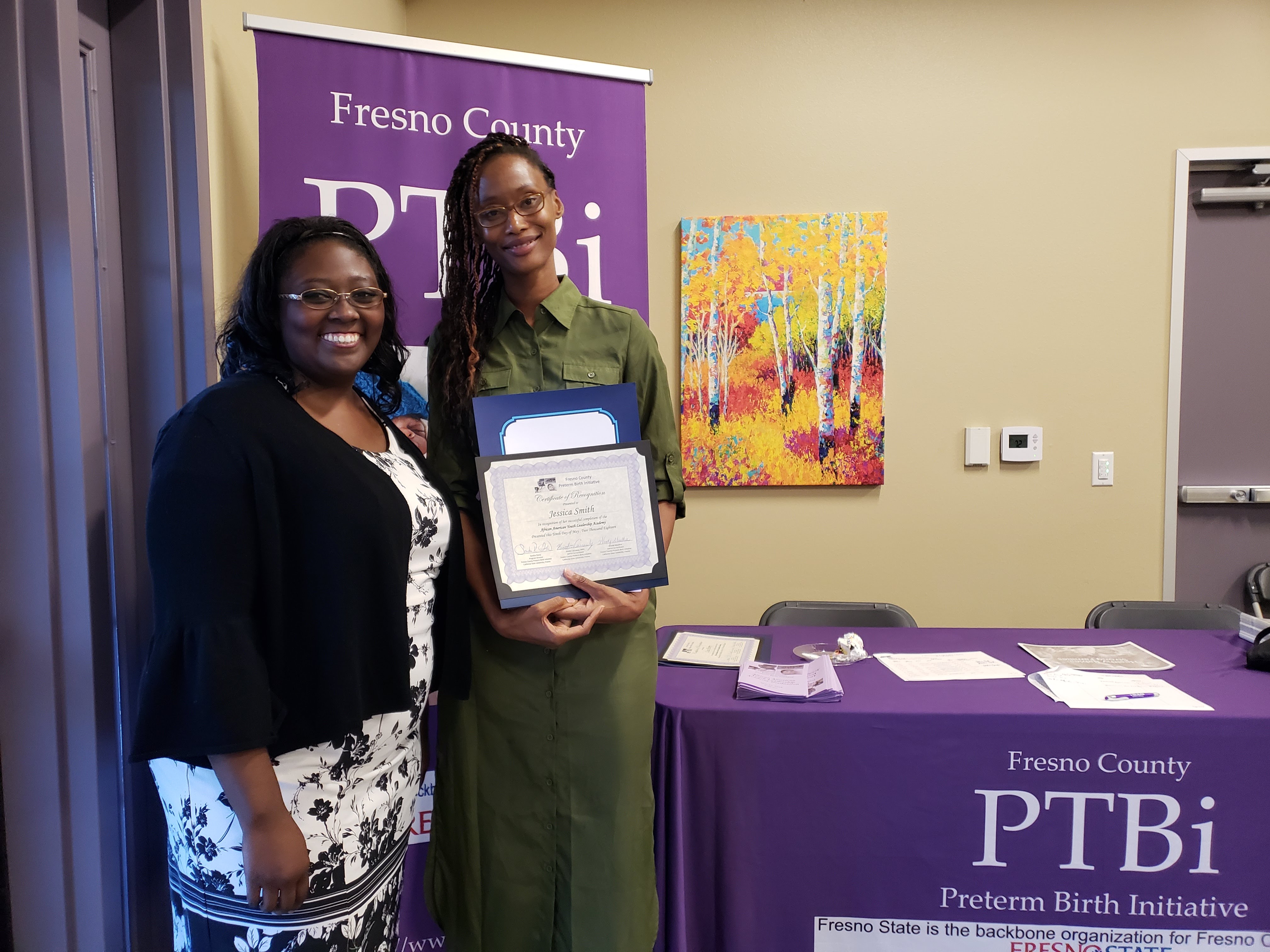 From left, Kristin Carraway and Jessica Smith at the African American Youth Leadership Academy graduation ceremony.