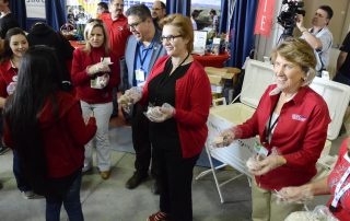 President Joseph Castro, first lady Mary Castro and Jordan College Dean Sandra Witte represent Fresno State at the World Ag Expo