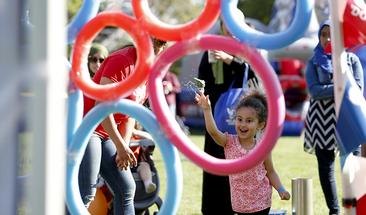 Little girl plays at Vintage Days