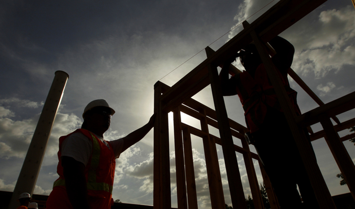 silhouette of construction workers