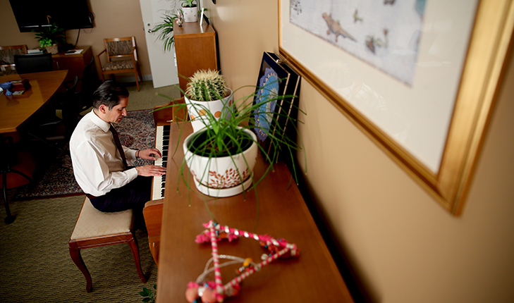 Provost Jiménez-Sandoval playing piano.