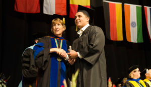 Fresno State alumnus Joseph Maldonado (pictured directly above at his 2016 graduation) is now the winemaker for Cardella Wines, started by alumnus Nathan Cardella (pictured atop the page) and his father in 2004.