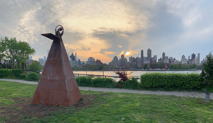 Beatriz Cortez, Tzolk'in I, 2018. Steel, motor, battery, timer, solar panel, acrylic, and lacquer marker. 132 x 64.5 x 64.5 inches. Commissioned by Clockshop. Courtesy of the artist and Commonwealth and Council, Los Angeles. Photo Credit: Scott Lynch, Socrates Sculpture Park, Queens, NY.