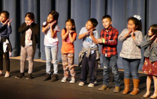 A group of elementary school children perform at Fresno State's Peach Blossom in a recent year.
