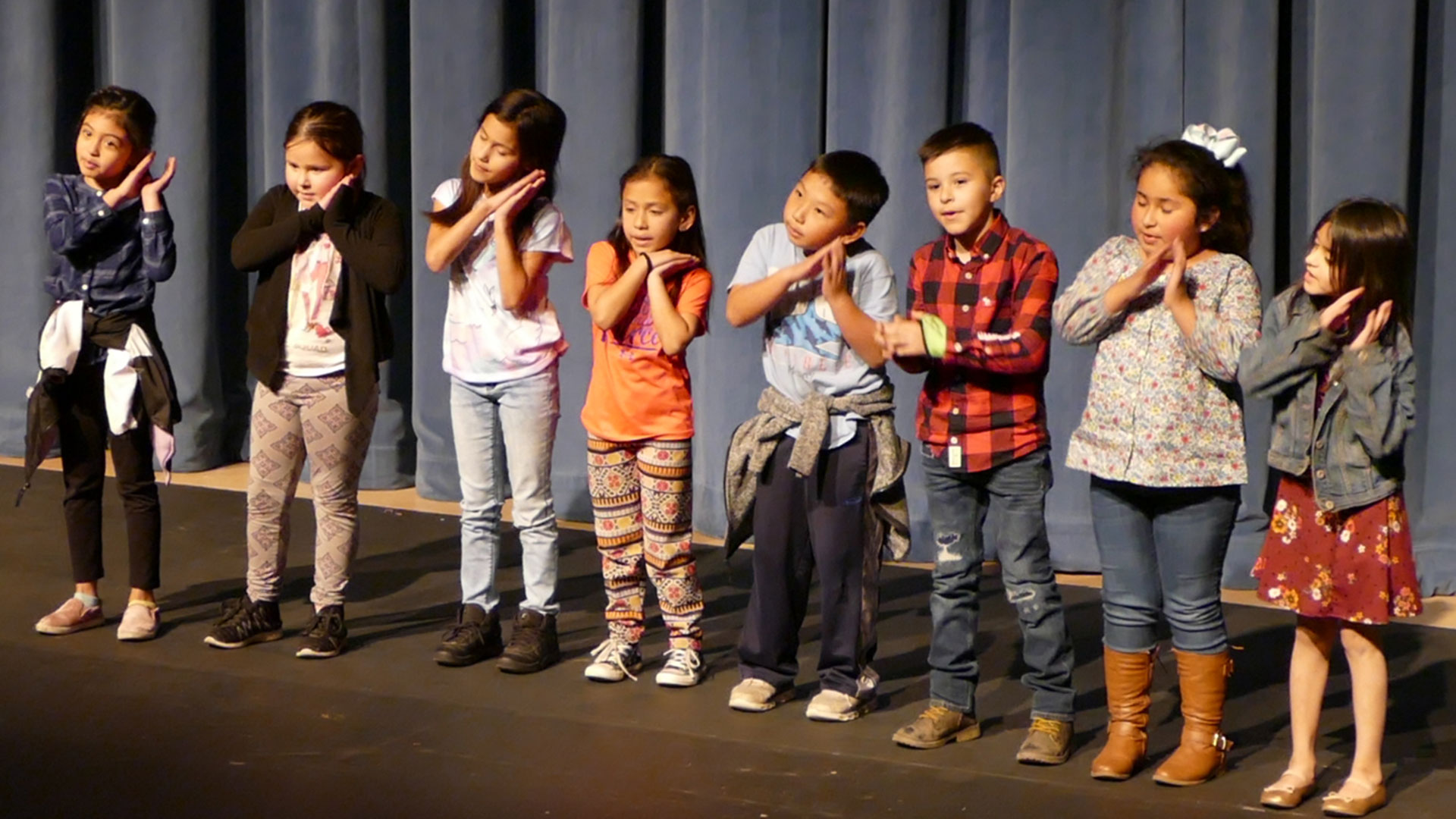 A group of elementary school children perform at Fresno State's Peach Blossom in a recent year.