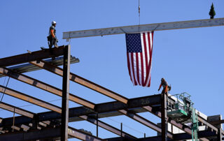 American flag tied onto structural beam