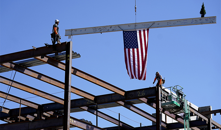 American flag tied onto structural beam