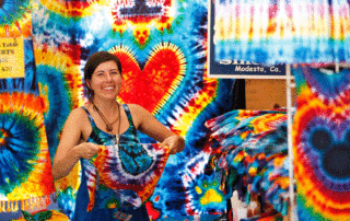 Vintage Days craft booth with tie-dyed items.