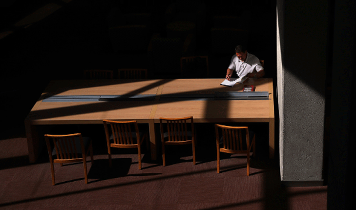 Student studying in the Madden Library.