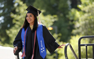 Girl in cap and gown for commencement