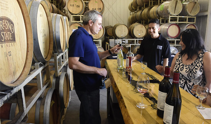 Fresno State wine being served at the winery.