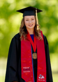 Amanda Skidmore in graduation robes