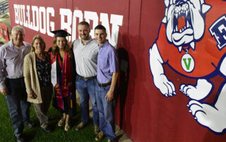 Ag business major Amanda Skidmore and her family on graduation day in Bulldog Stadium.