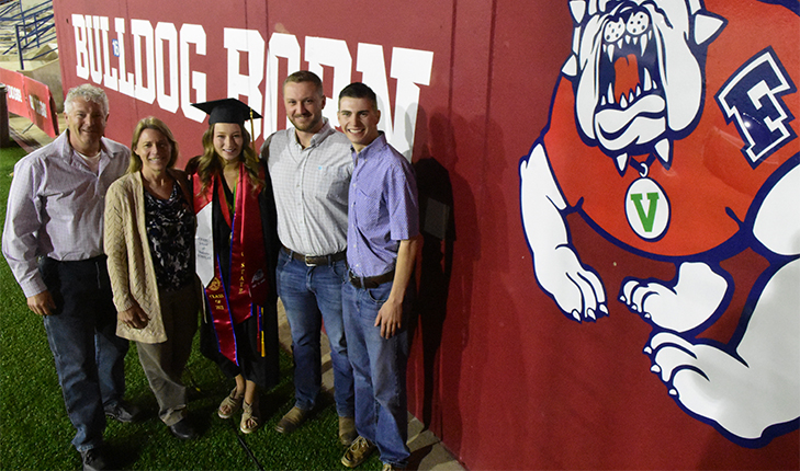 Ag business major Amanda Skidmore and her family on graduation day in Bulldog Stadium.