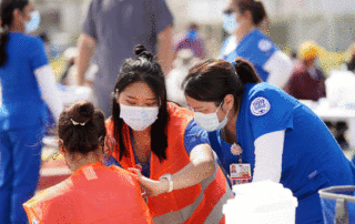 Fresno State nursing students provide vaccinations to the community.