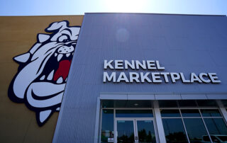 Kennel Marketplace with Bulldog logo painted on side
