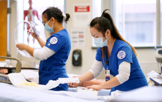 Nursing students working