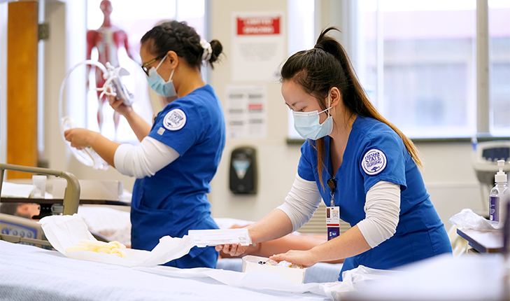 Nursing students working