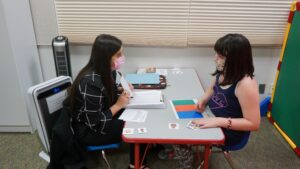 Client Dylan Blackstone works with graduate student Destiny Gilbreath at the Speech, Language and Hearing Clinic at Fresno State.