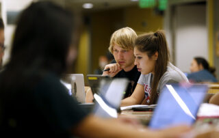 Students working on computers.