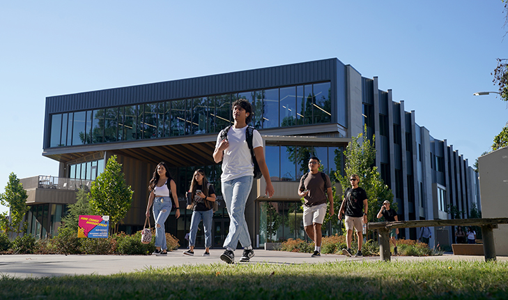 Fresno State students walking past the new Resnick Student Union.