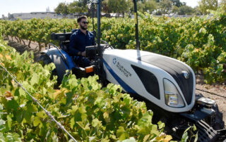 Yanir Ariav driving tractor.