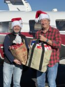 Dr. Tamas Forgacs (left) and another Angel Flight West pilot.