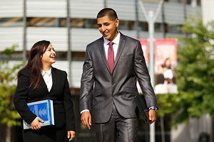 Business students in front of library