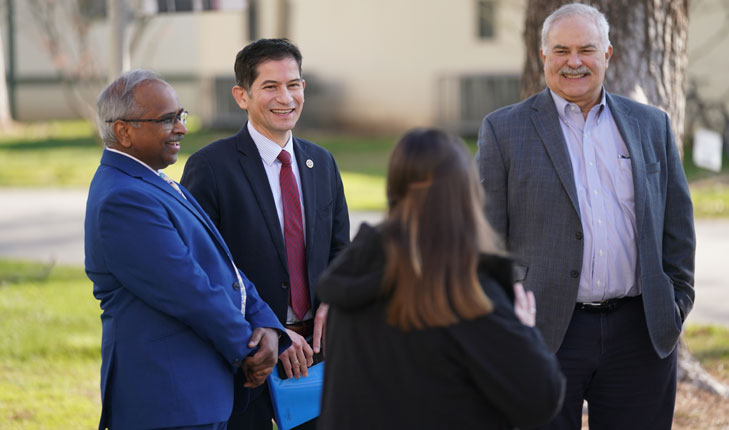 Lyles College of Engineering Dean Ram Nunna (left) with Fresno State President Saul Jimenez-Sandoval and others.