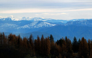 Snow-capped mountains surrounding Fresno.