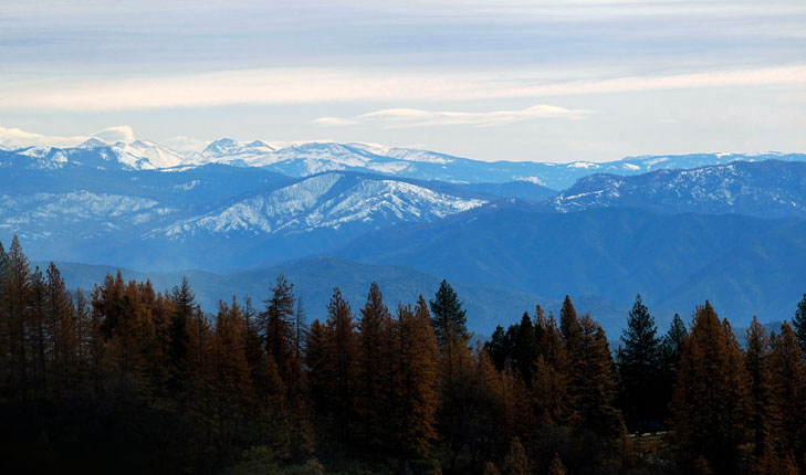 Snow-capped mountains surrounding Fresno.