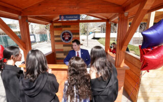 University President Saul Jimenez-Sandoval opens a new president's booth on campus to meet face-to-face with students.