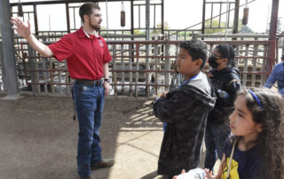 Brendan Black giving 4th grade farm tour
