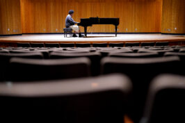 Maurissio Rodriguez, a Fresno State music student who is on the autism spectrum, has been preparing for a special, sing-a-long performance at the College of Arts and Humanities commencement. Photos by Cary Edmondson