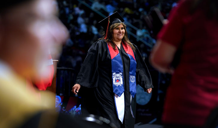 After many ups and downs, Shirley Jones walks across stage at Fresno State's commencement after earning her degree in sociology.