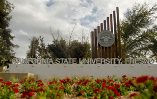 California state university Fresno sign with flowers