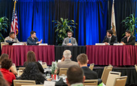 Students discussing on stage