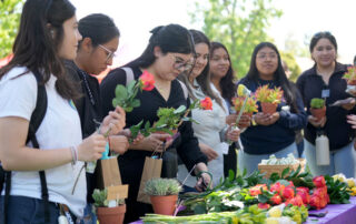 Women making flower bouquets