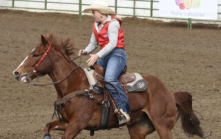 McKenna Wood competes in barrel racing.