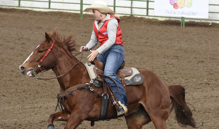 McKenna Wood competes in barrel racing.