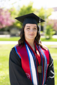 Andrea L. Barnett, Kremen School, in graduation robes. 