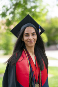 Jasmine Badhesha, Craig School, in graduation robes.